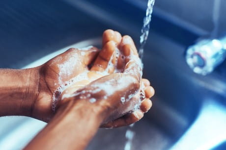 person washing hands