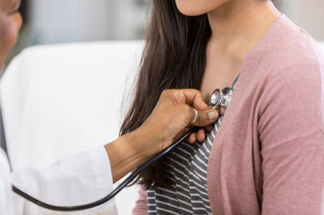 A women checking her heart rate