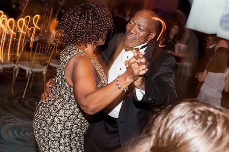 A spirited couple dances at a formal philanthropic event to benefit several programs Geisinger.