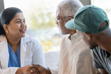 A man talking to his doctor at a Geisinger ConvenientCare clinic