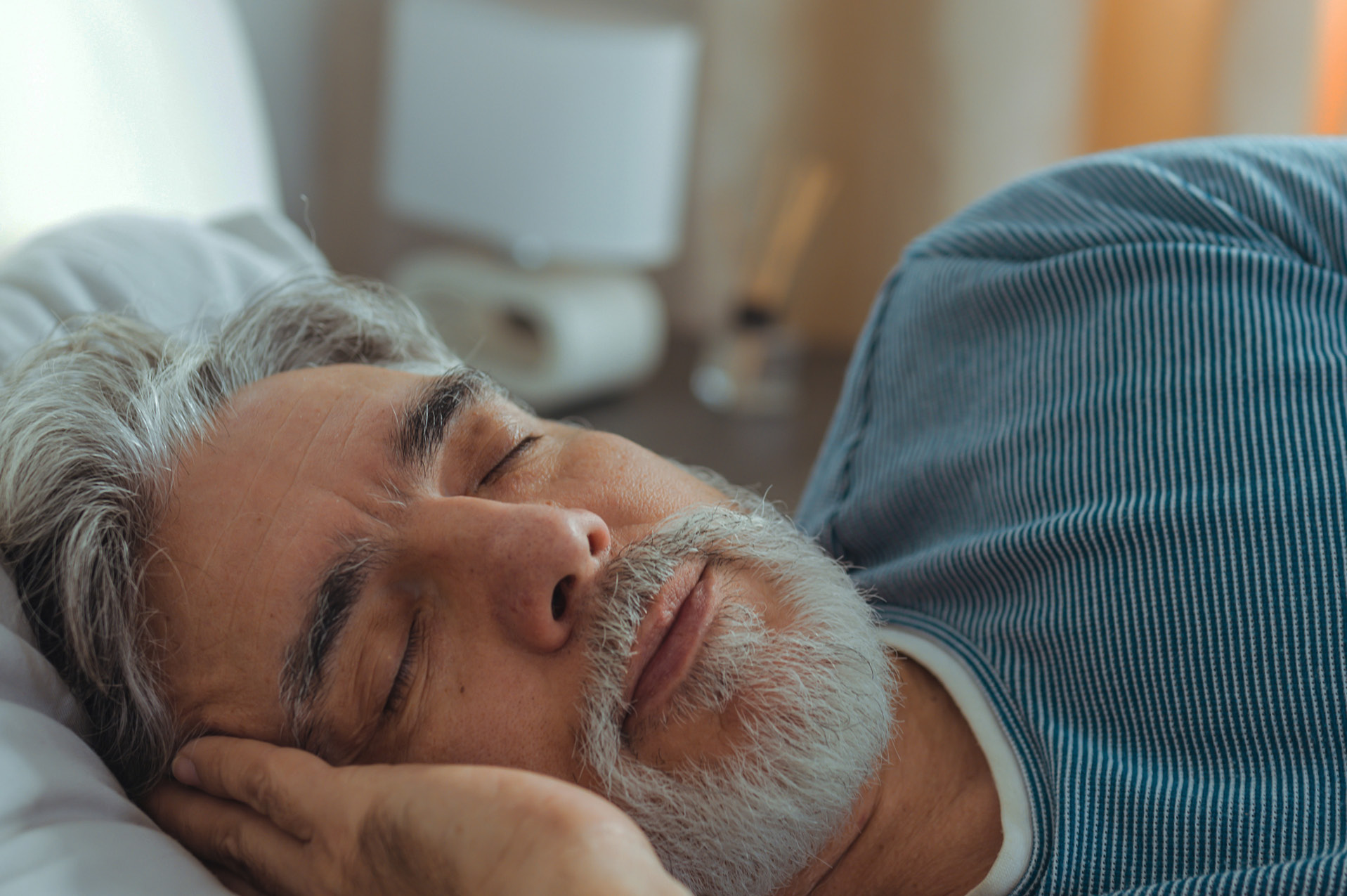 man sleeping following bedtime routine