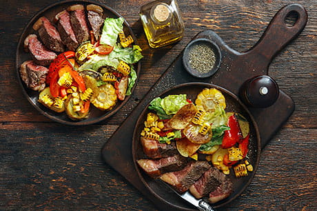 Steak and potatoes come together to make a unique and hearty salad.