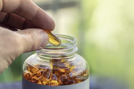 A bottle of fish oil pills