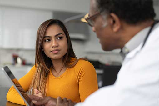 millenial speaking to a doctor