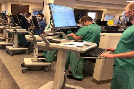 The Geisinger Community Medical Center ICU team during patient rounds