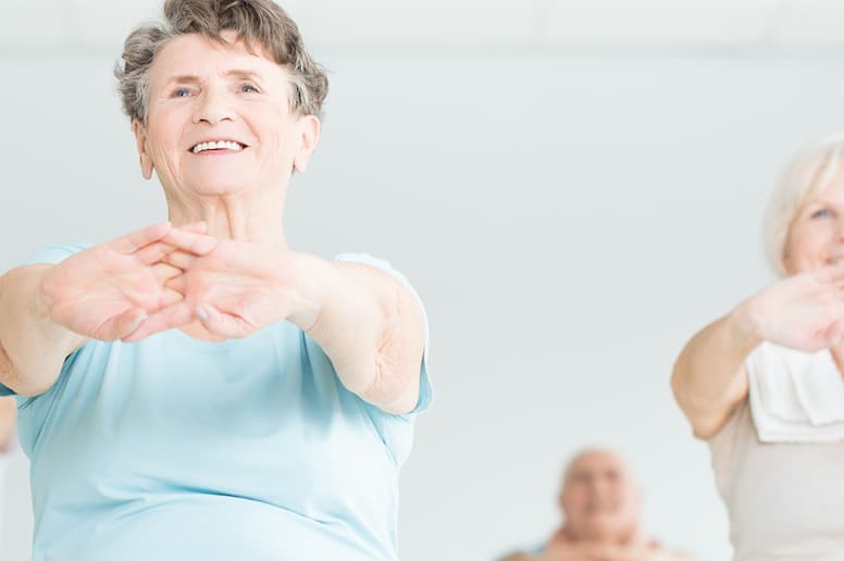 Several seniors in an exercise class