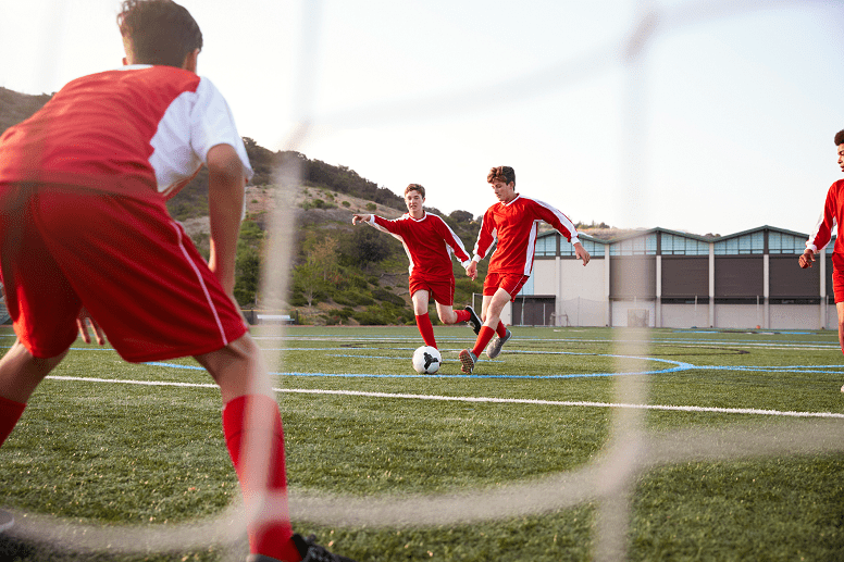 High school boys playing soccer