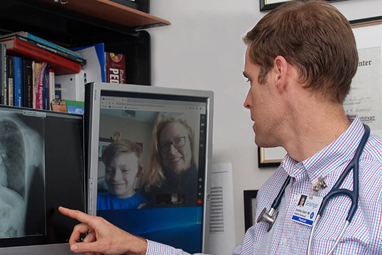 doctor with patient in a telemed appointment