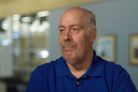 man in blue shirt