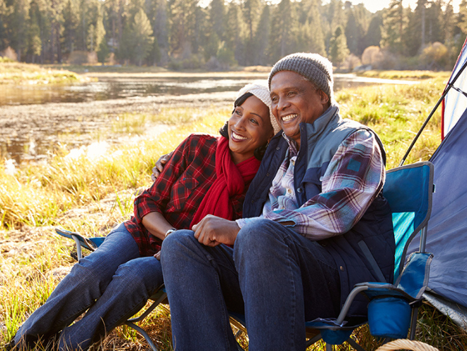man and woman camping
