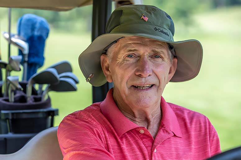 Harry Gaughan in a golf outing after recovering from brain surgery.