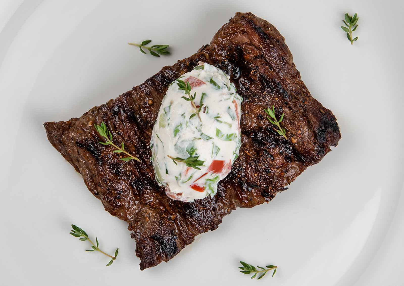 Greek-style flank steak with tangy yogurt sauce.