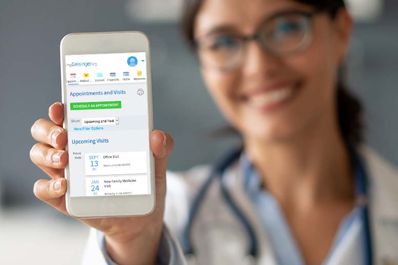 doctor holding up a phone showing you the mygeisinger app