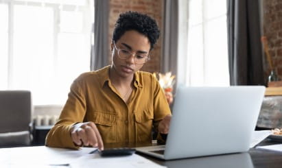a female accountant paying bills