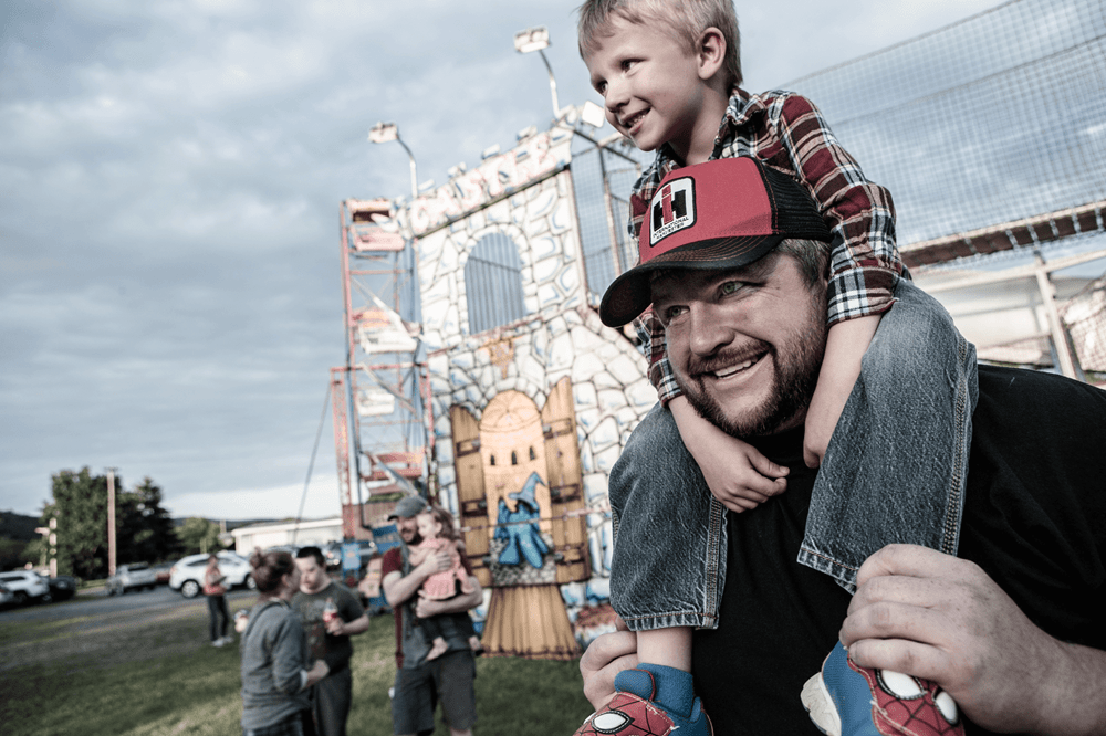 A father and son at an amusement park