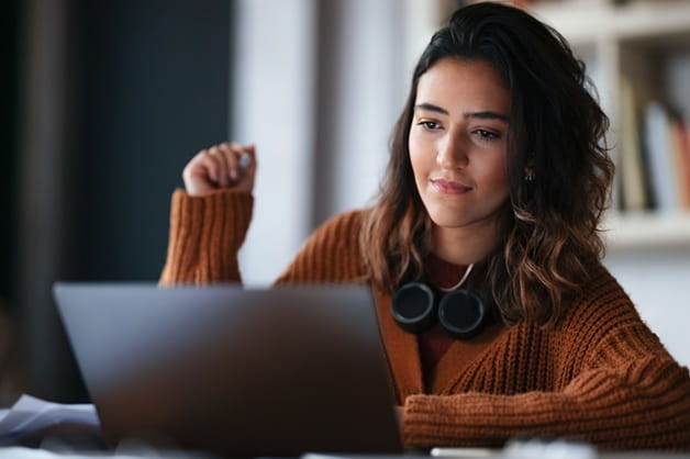 A woman talking to her behavioral health provider online