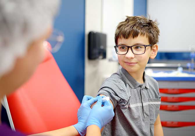 A boy getting a vaccination