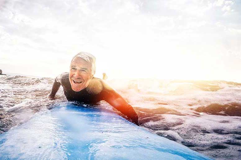 senior man surfing