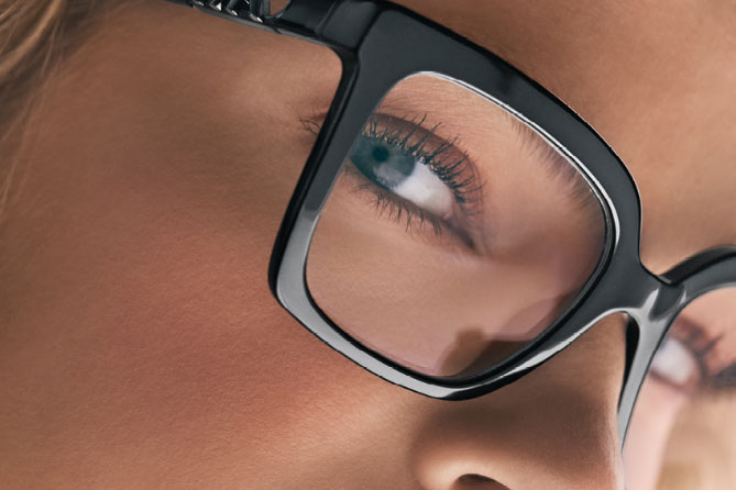 a women wearing black glasses