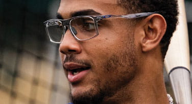 A man wearing clear glasses