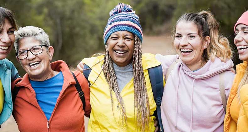 woman of all generations smiling outdoors