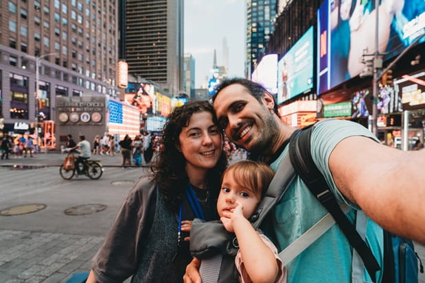 A smiling family in Times Square
