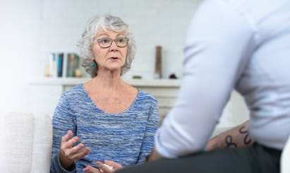 A woman talking to her doctor