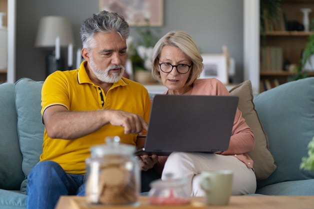 A couple shopping online for health insurance