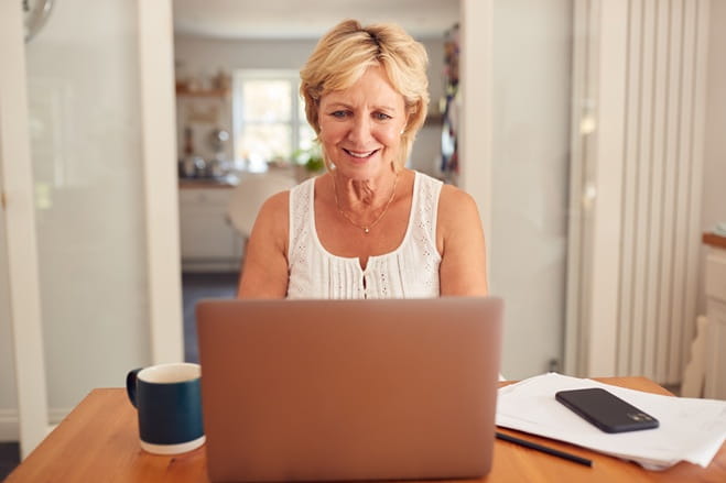 male senior shopping online