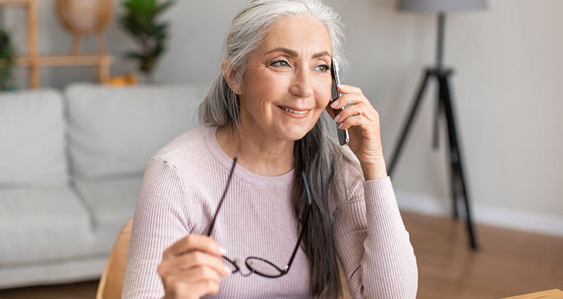 Woman talking on phone.