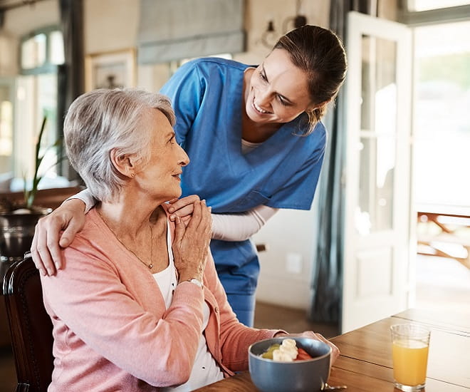 A Geisinger at home nurse with a patient