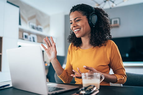 Woman in yellow shirt on a video call