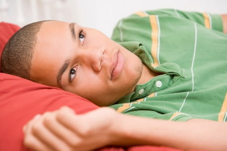 Teenager lying down