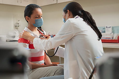 Teenage daughter visits an OBGYN for the first time.