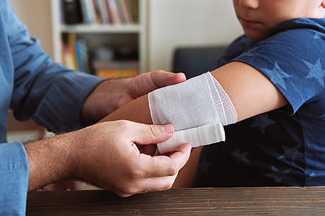 A child being treated for a dog bite