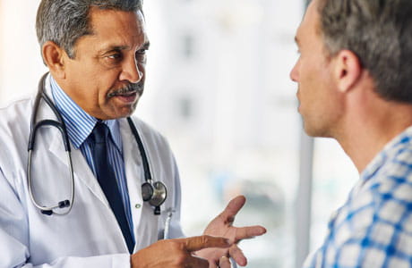 Doctor consulting a man patient. 