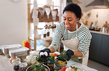 A woman cooking in the kitchen