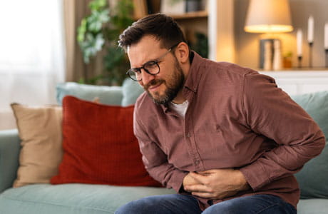 Man experiencing  dumping syndrome after weight loss surgery