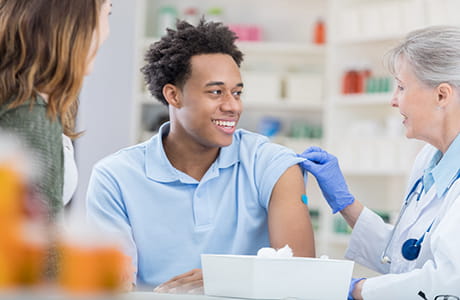 A man getting vaccinated. 