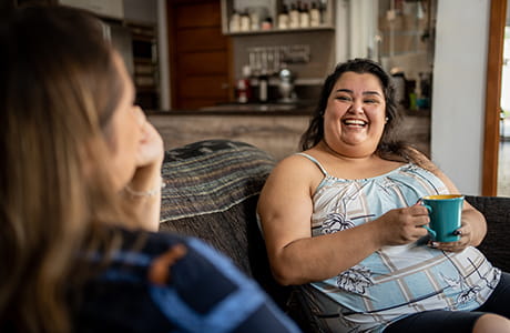 Two women talking about weight loss.