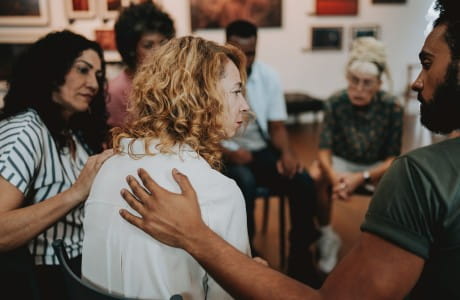 A person receiving treatment in a supportive setting
