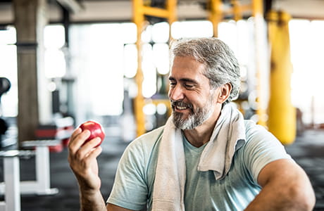 Mature man practicing healthy eating and fitness in preparation for kidney transplant surgery