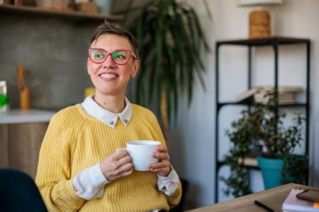 A woman feels relief after treating menopause symptoms.