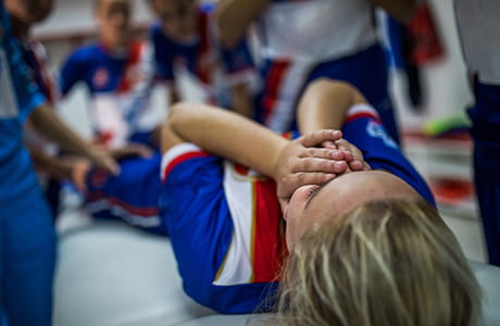 A young athlete being treated on the field