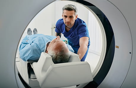 A man entering an MRI machine
