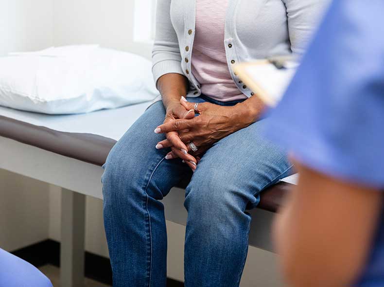 A patient talking to a doctor