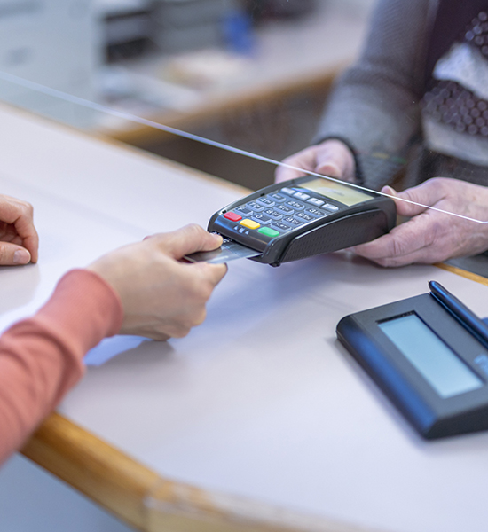 person paying with card