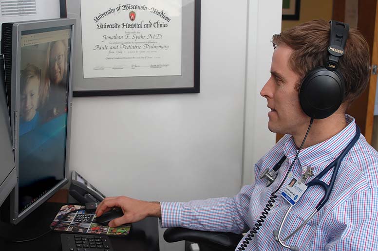 A Geisinger provider meets with a patient during a telemedicine visit.