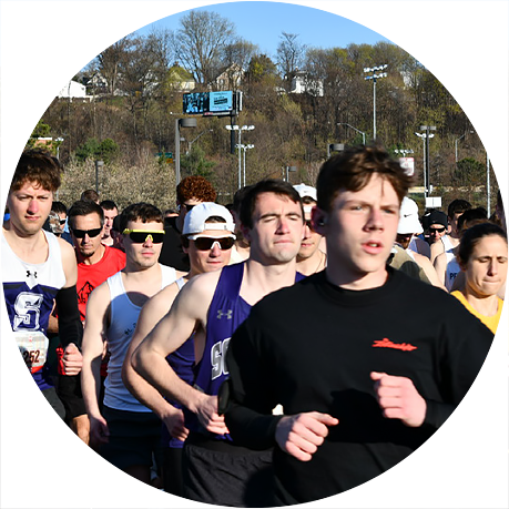 Crowd of runners participating in a marathon race, representing community fitness events and endurance sports training.