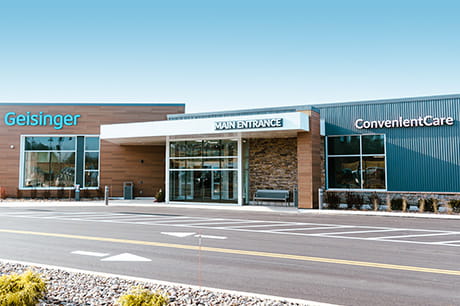 Geisinger ConvenientCare clinic exterior with main entrance signage, representing accessible urgent care and outpatient medical services.